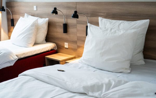 Good Morning Triple Room puder på sengen