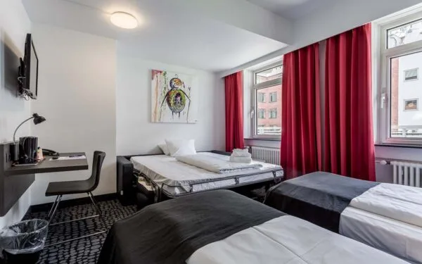 Classic Twin Room Four sovesofa redt op